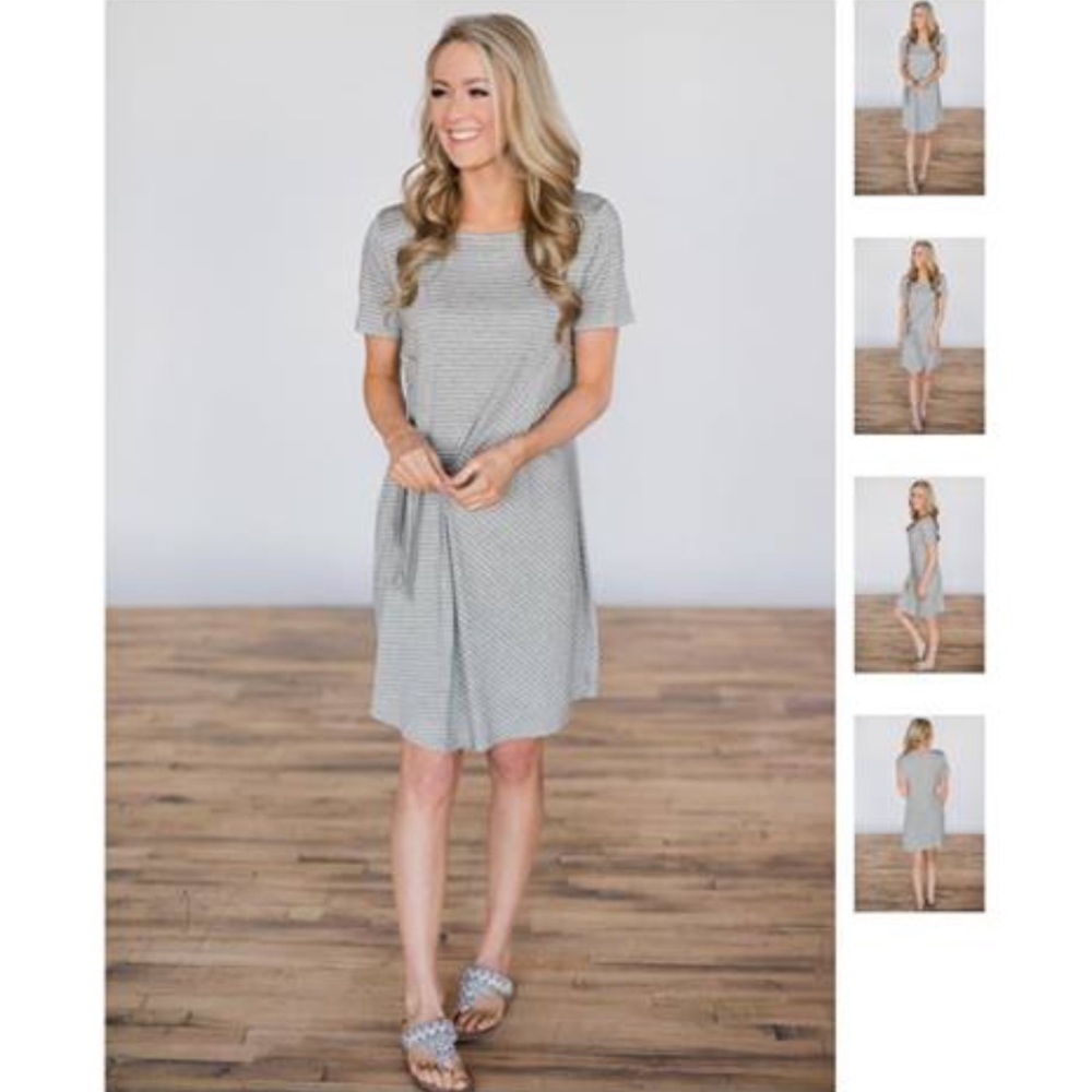 Boutique New with tags Grey striped dress. Small